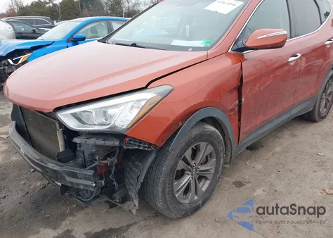 2015 Hyundai Santa Fe Sport 2.4L z USA, uszkodzony, nr VIN 5XYZUDLBXFG283638